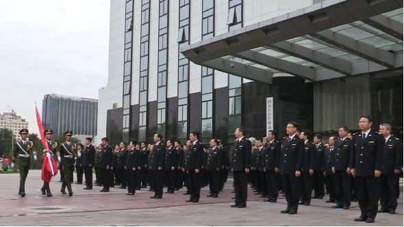 海关总署举行升国旗仪式庆祝中华人民共和国成立65周年(图)